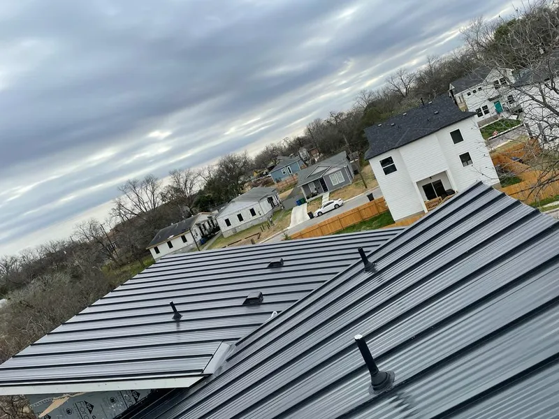 Standing seam metal roof panels with vents for Skylight Repair in St. Johnsbury